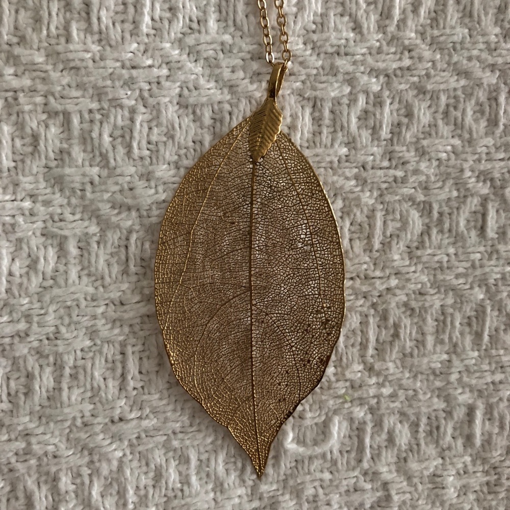 Gold plated earring and necklace. Leaf details NWT